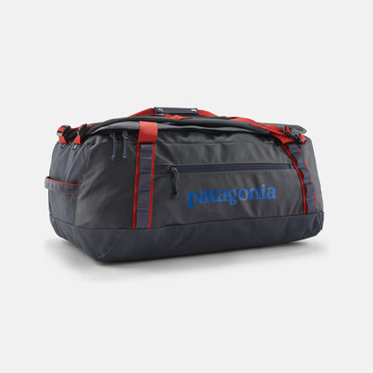 Black Hole Duffel 55L | Smolder Blue w/Amanita Red