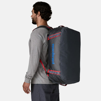 Black Hole Duffel 55L | Smolder Blue w/Amanita Red