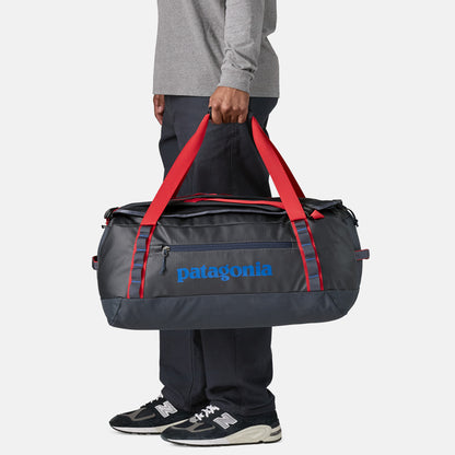 Black Hole Duffel 55L | Smolder Blue w/Amanita Red